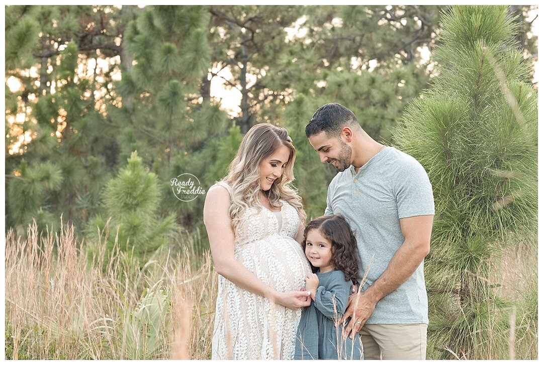 Family of 3 during a maternity session in Miami, FL