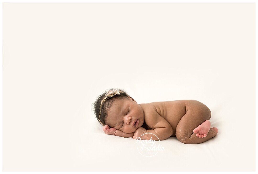 Best Newborn Photographer in South FL posing newborn girl Ivanna Vidal Photography