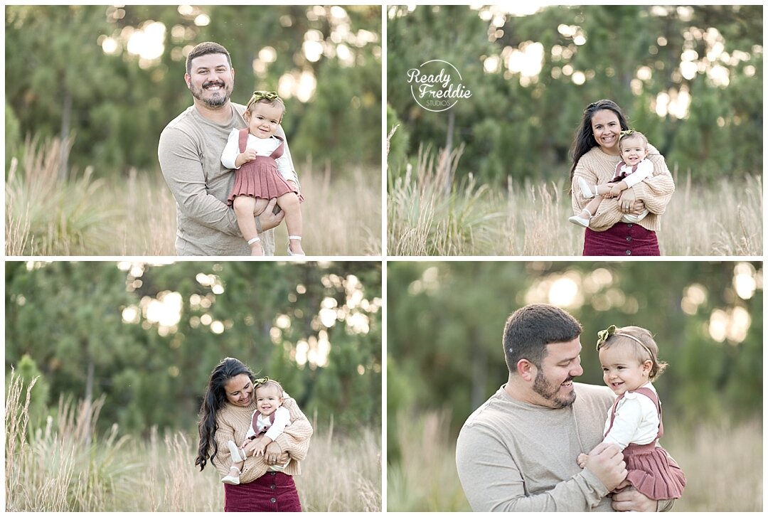 Mom and Dad with baby girl at the field | Ready Freddie Studios in Miami, FL