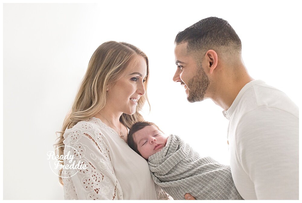 Family of 3 during Newborn photography session | Ready Freddie Studios in Miami, FL