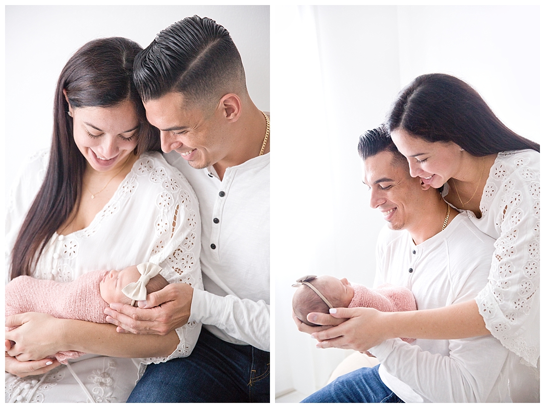 mom and dad holding newborn baby | south fl newborn photographer