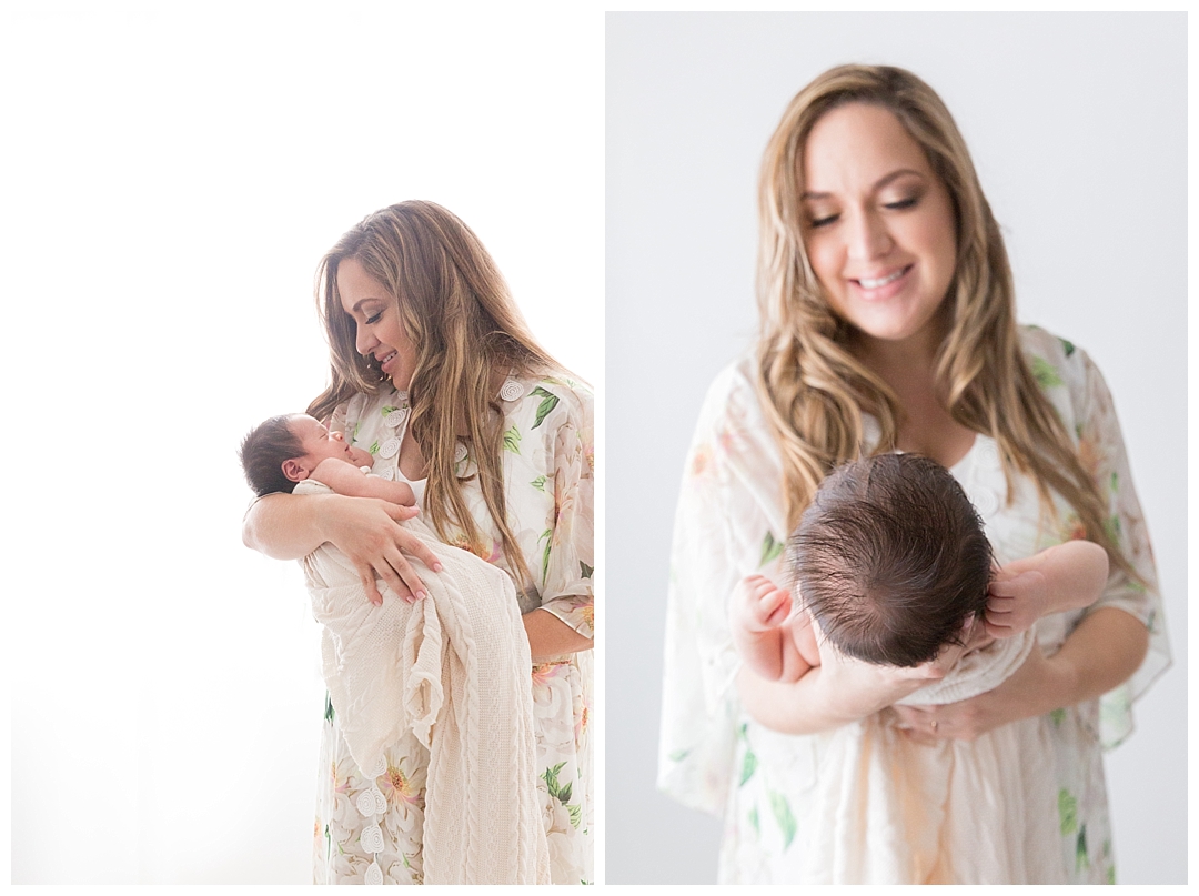 mom holding newborn during photoshoot | miami fl newborn photographer
