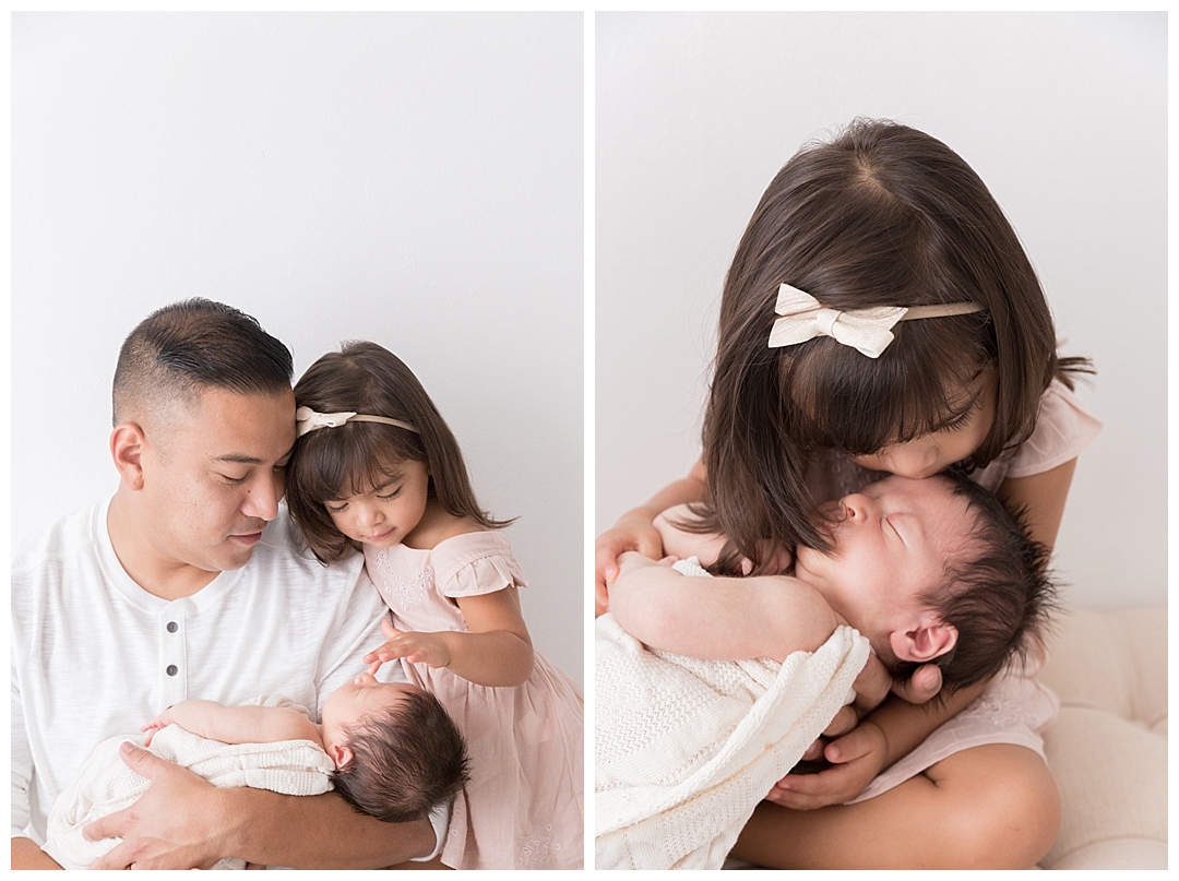 dad holding babies | miami family photography studios