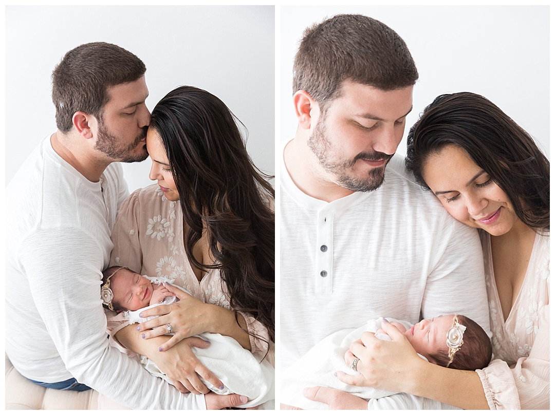 mom and dad holding newborn baby | miami newborn photographers