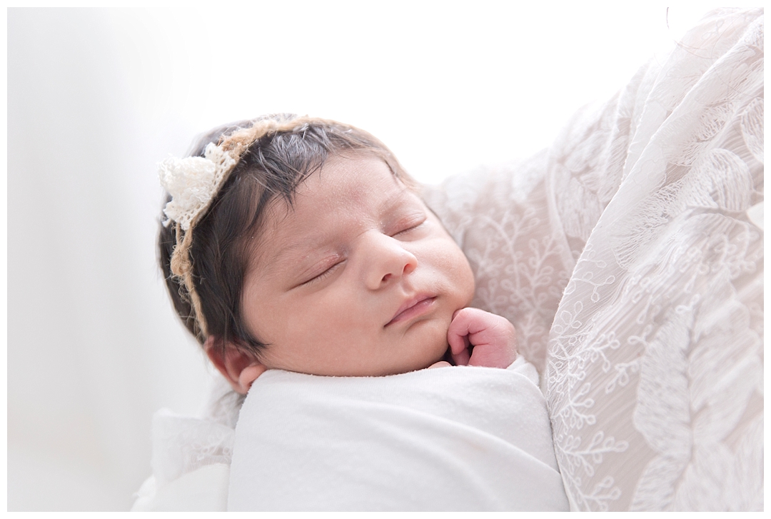 baby in moms hands | Miami baby photographer