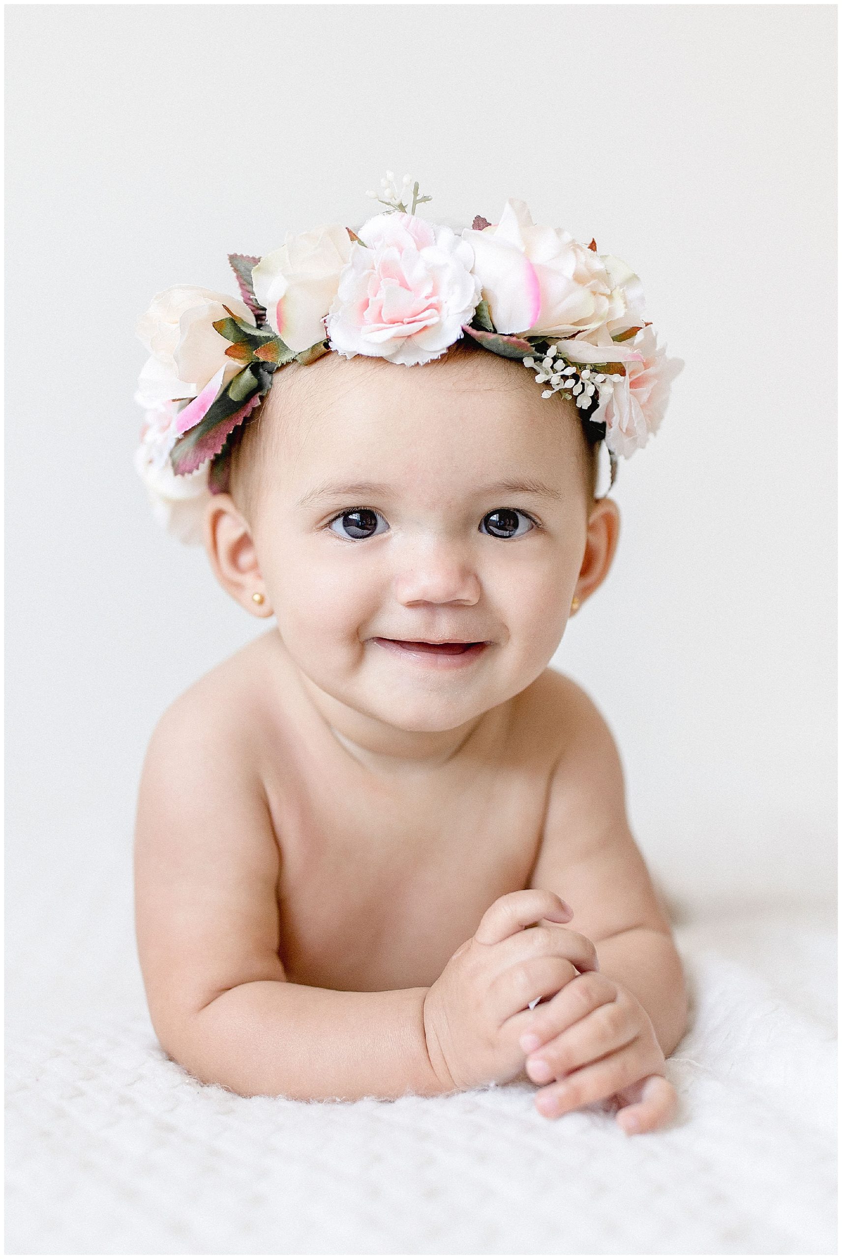 Baby girl with flower crown. Photos by Ivanna Vidal Photography.