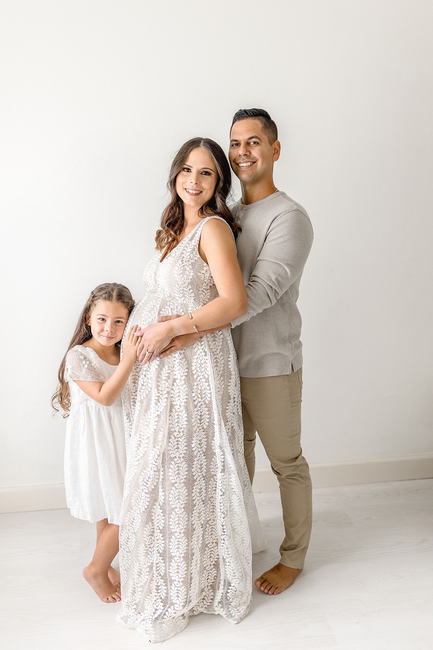 Family of three during Miami maternity session. Photo by Ivanna Vidal Photography.
