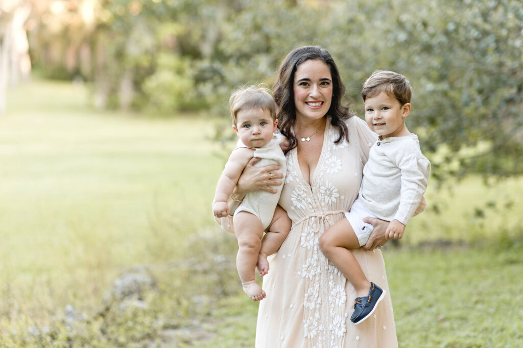 mom holding her two kids at Matheson Hammock Park Maternity Photoshoot locations in Miami