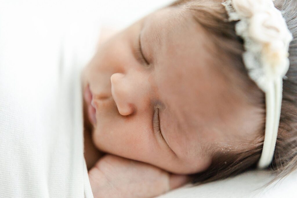 details of a newborn baby girl sleeping Miami Ultrasound